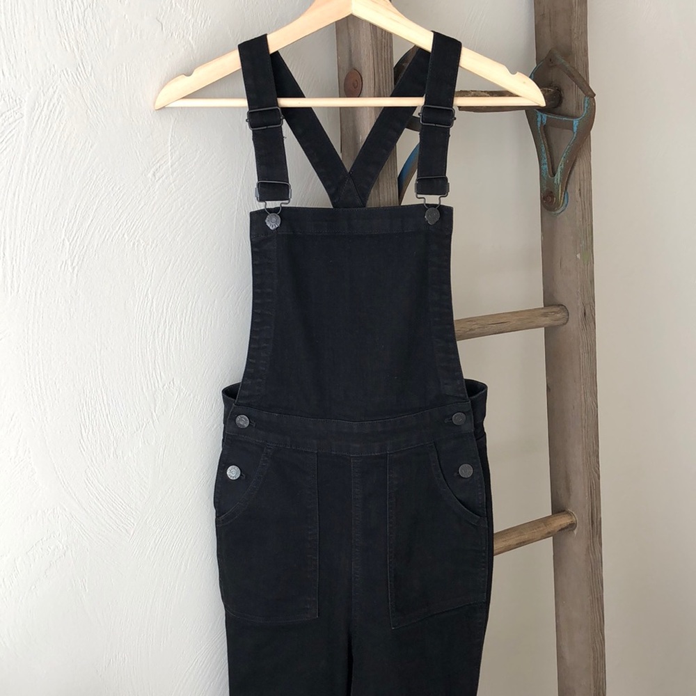 Black button overalls